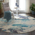 2' X 4' Ivory And Teal Blue Abstract Power Loom Non Skid Area Rug